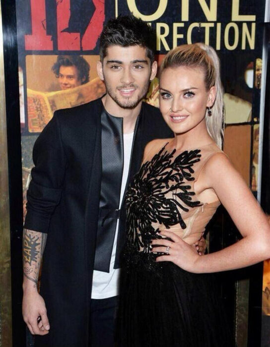 Zayn Malik y Perrie Edwards posando para una fotografía