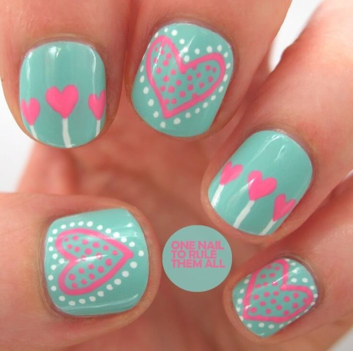 Diseños de uñas en colores rosa y rojo para San Valentín