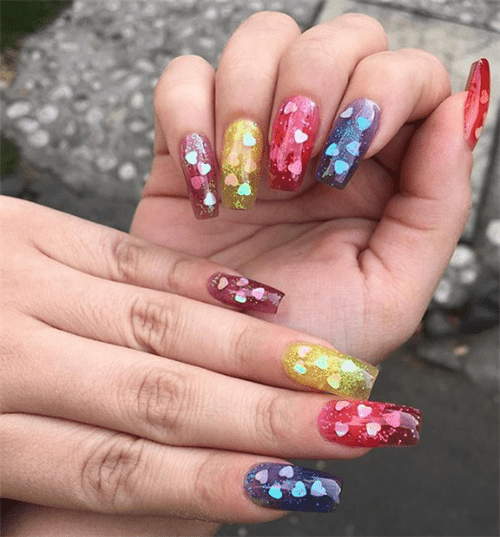 Uñas efecto gelatina con decorado de estrellas