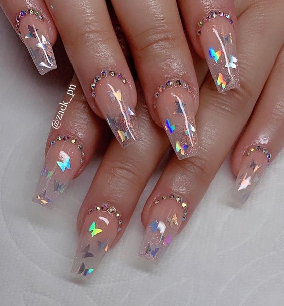 Uñas de efecto cristal con flores en la punta