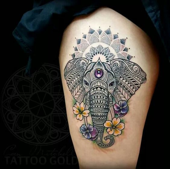 Tatuaje de elefante con mandala en la pierna