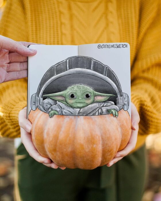 dibujo de Baby Yoda sobre una calabaza