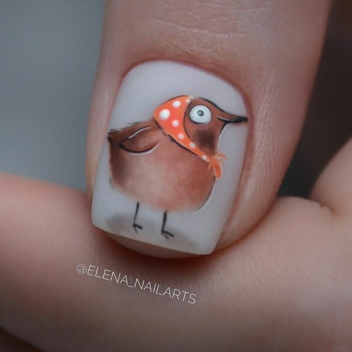 diseño de un pájaro en una uña