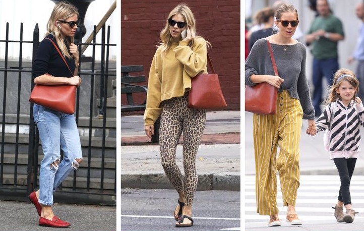 Sienna Miller usando un bolso de color rojo