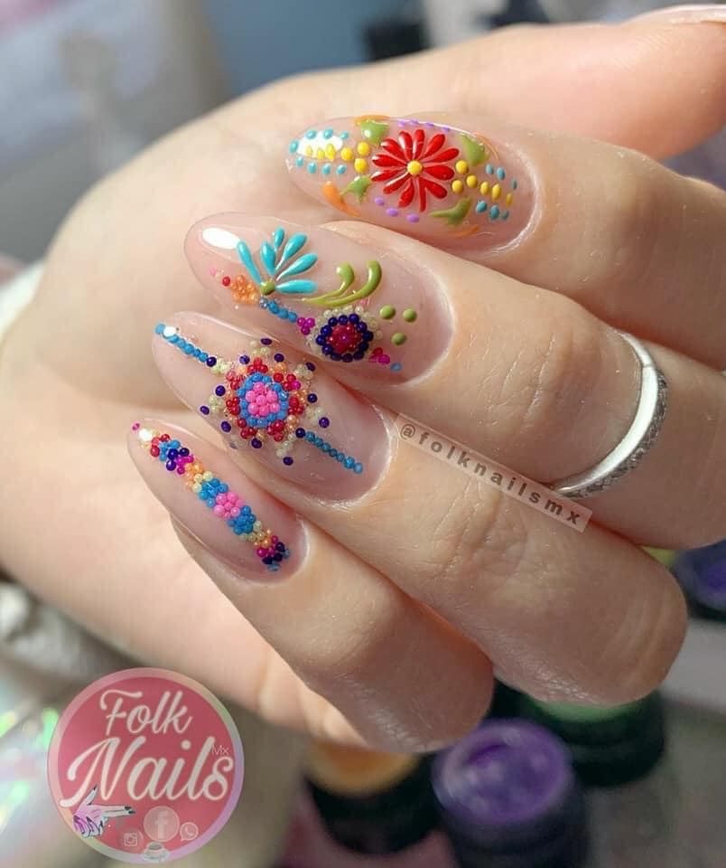 Uñas cristal con guías de colores; 20 Ideas para darle a tus uñas un estilo mexicano y lleno de color