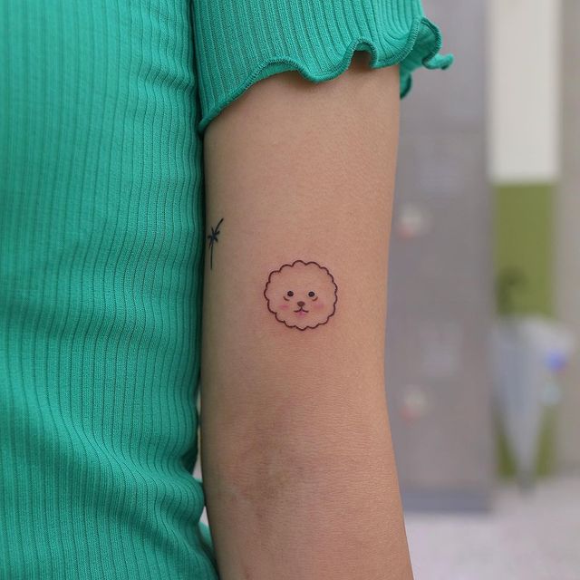 Cara de una mascota ;13 Tatuajes minimalistas a los que no te podrás resistir