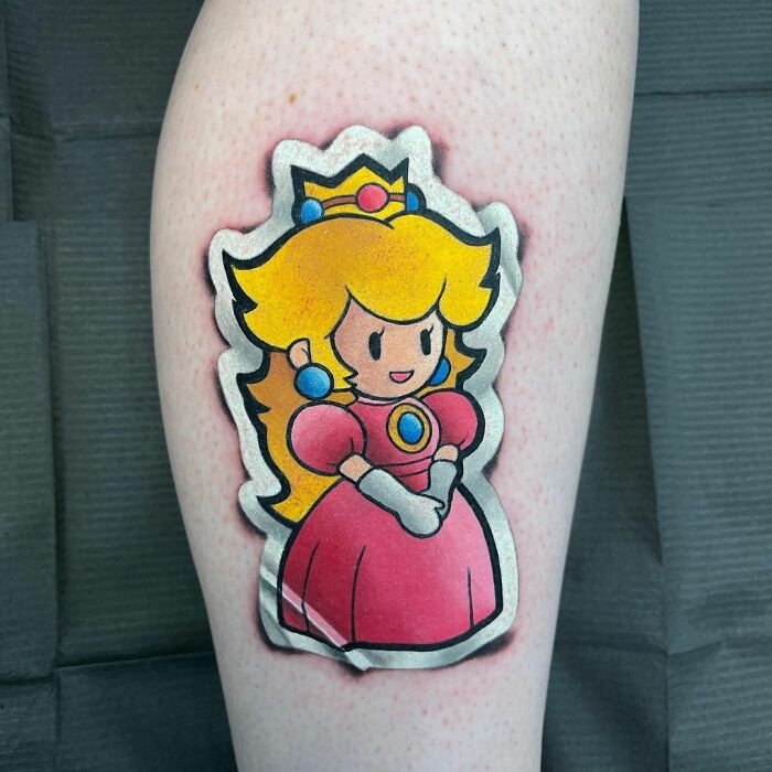 Princesa Peach ;Artista crea hermoso tatuajes que parecen 'stickers' para la piel