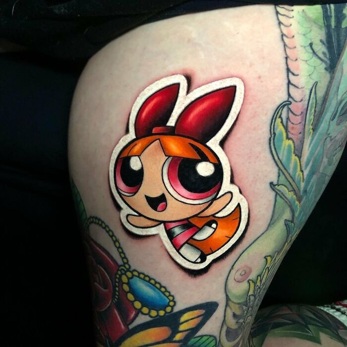 Bombón ;Artista crea hermoso tatuajes que parecen 'stickers' para la piel