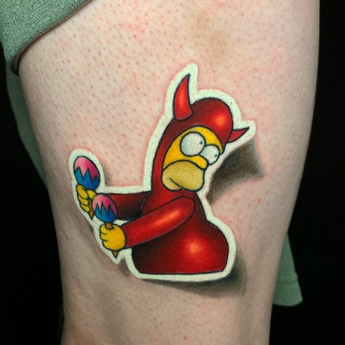 Homero Simpson ;Artista crea hermoso tatuajes que parecen 'stickers' para la piel