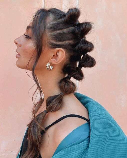 Chica con trenzas bubble o burbujas; 13 Trenzas estilo 'bubble' para darle un giro a tu clásico peinado