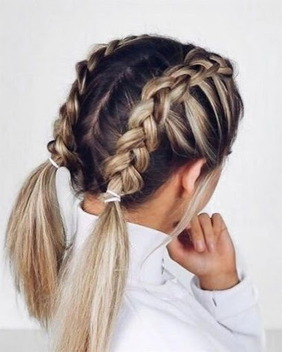 Chica con un peinado de trenzas