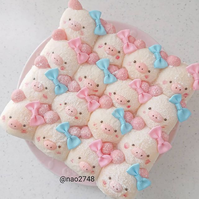 pan de colchón en forma de cerditos con moño; Platillo elaborado por nao2748; Hermosa comida de bento estilo japonés