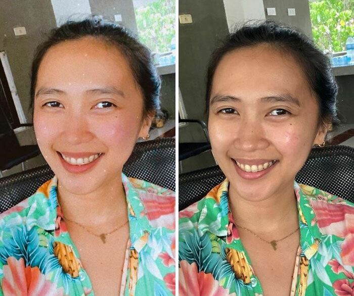 Chica asiática sonriendo con el cabello sujetado hacia atrás en un chongo y vistiendo una camisa verde floreada