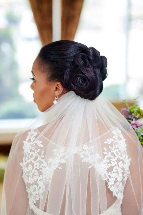 Recogido de novia alto con velo