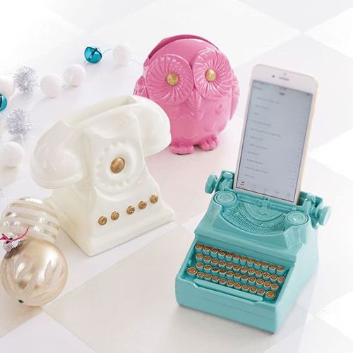 Soporte para celular en forma de maquina de escribir