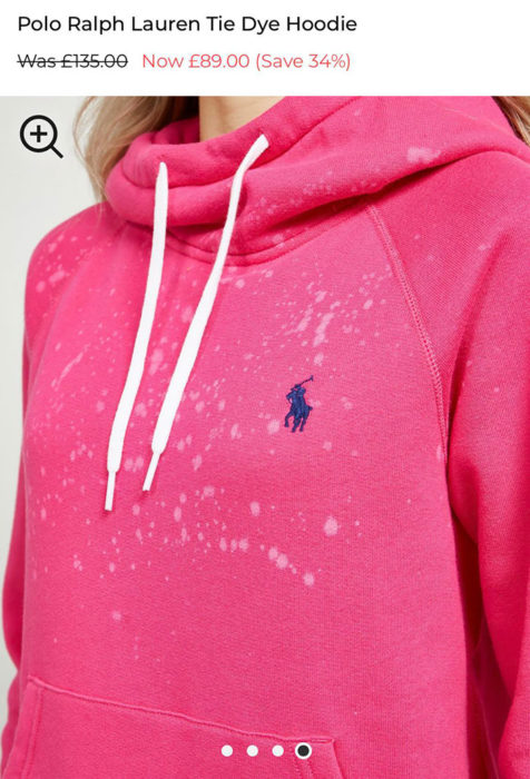 Sudadera rosa con manchas de detergente