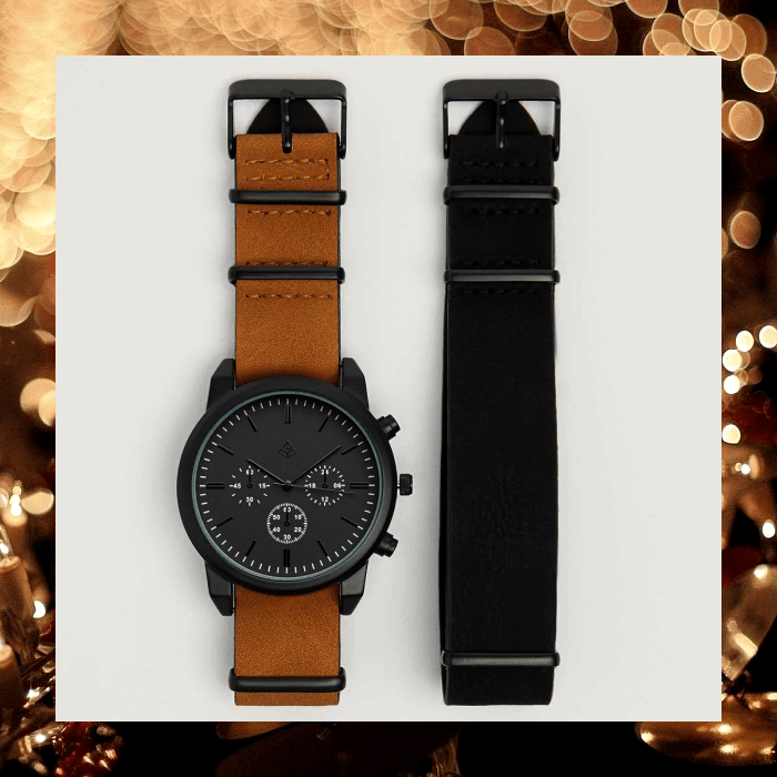 reloj negro con correa intercambiable color café y negro