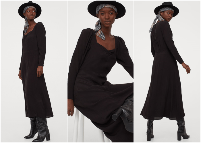 chica morena usando un sombrero de ala ancha negro, vestido negro largo con escote cuadrado y manga larga, botas de tacón largas de cuero negro