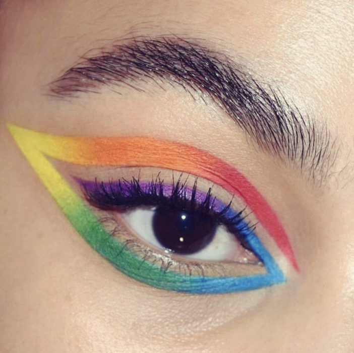 Delineado estilo arcoíris en colores azul, morado, amarillo, naranja en forma circular
