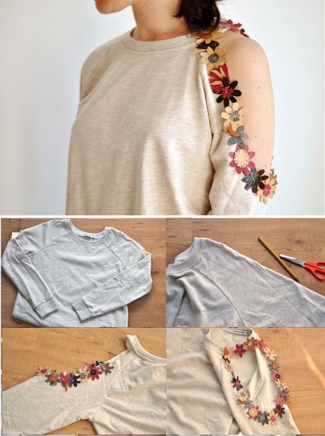 Chica con suéter beige decorado de un costado con flores de colores