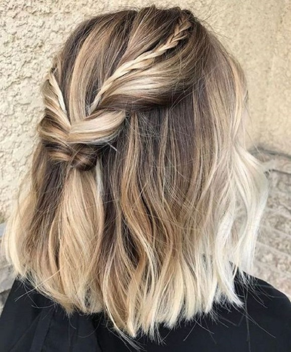 Chica peinada con twist y trenzas