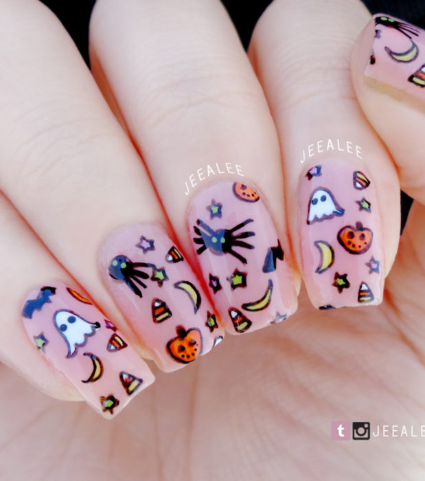 Diseños de uñas largas cuadradas kawaii, tiernas en colores pastel de Halloween; fantasmas, murciélagos, calabazas, lunas y dulces