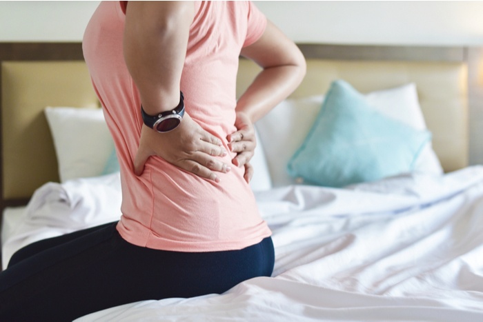 Mujer con dolor de espalda