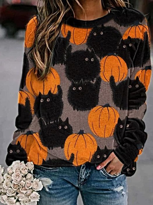 Suéter inspirado en Halloween con estampado de calabazas y gatos negros