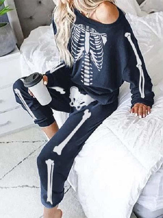 Pijama inspirada en Día de muertos, color azul marino, con estampado de esqueleto en todo el cuerpo