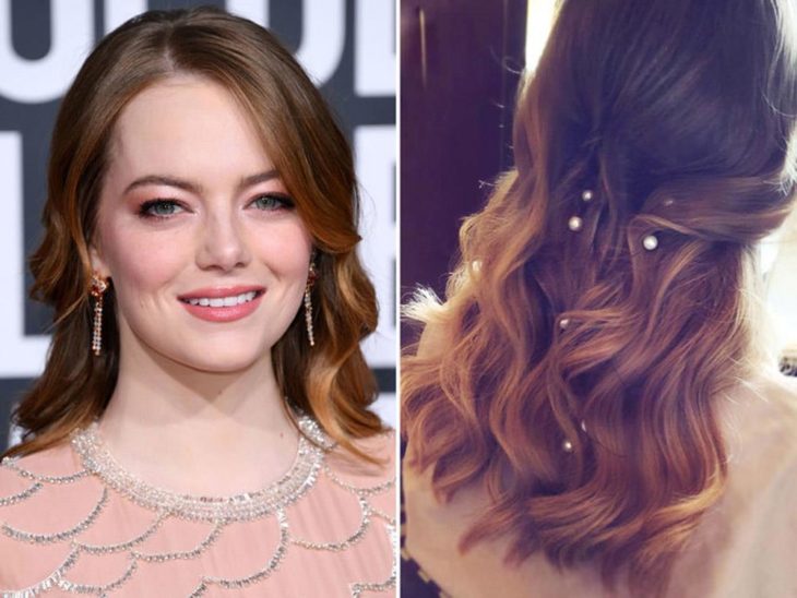 Emma Stone mostrando su cabello semi-recojido con perlas