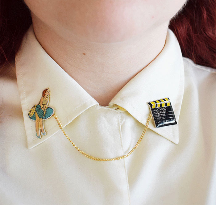 Broche para camisa en forma de claqueta de cine