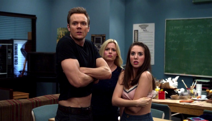 escena de community