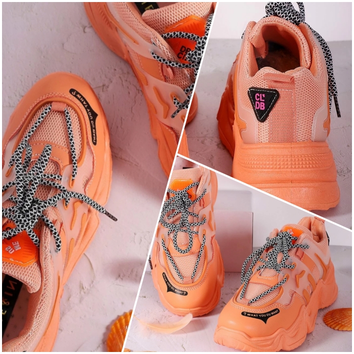 tenis deportivos de color naranja con agujetas color blanco y negro, plataforma y detalles de mesh