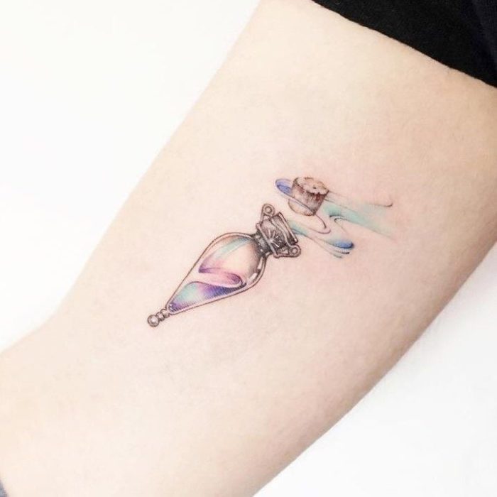 Tatuaje inspirado en Harry Potter, de la poción Felix Felicis