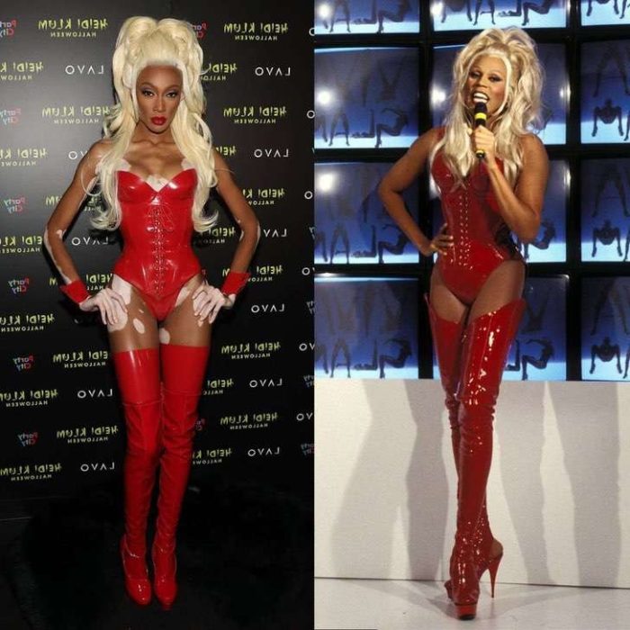 Winnie Harlow disfrazado como RuPaul con un corset rojo y botas altas de cuero