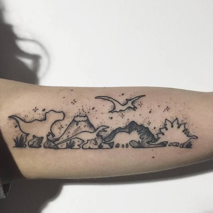 Tatuaje de dinosaurio femenino