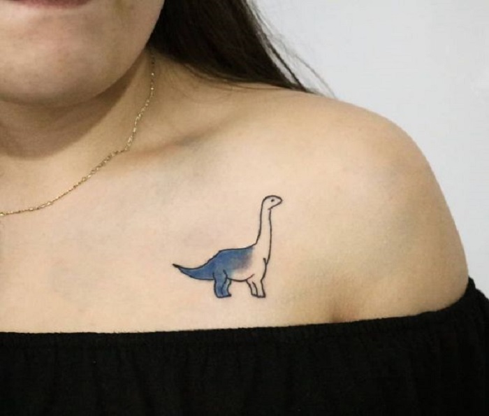 Tatuaje de dinosaurio femenino