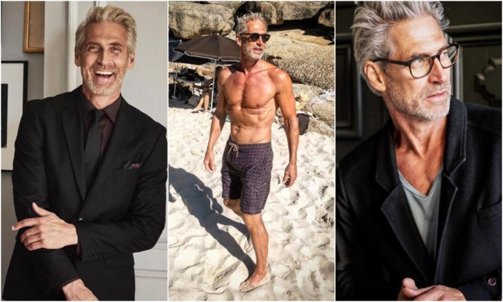 Anton Nilsson paseando en la playa sin camisa