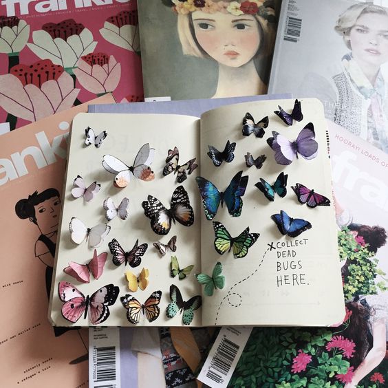 Libreta decorada con recortes de mariposas en 3D