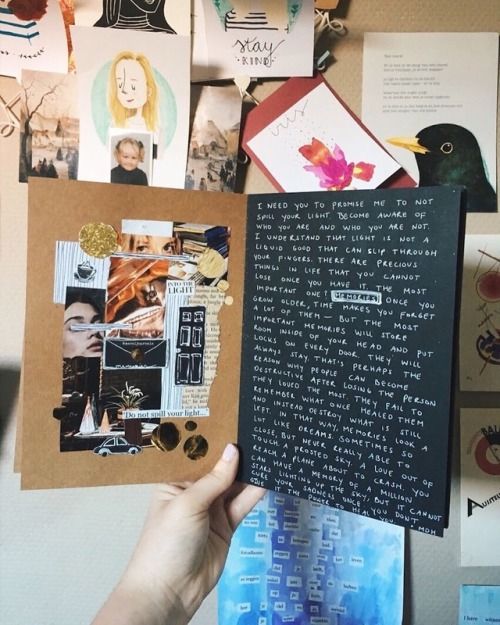 Libreta con hojas negras y recortes de revista