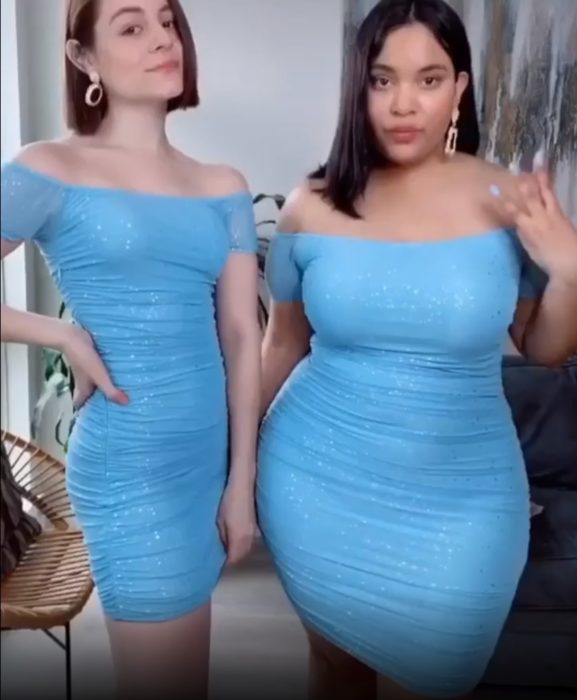 Maria y Denise usando un vestido azul cielo ajustado