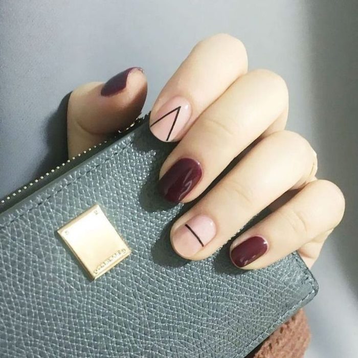 Manicura en colores vino y rosa pastel