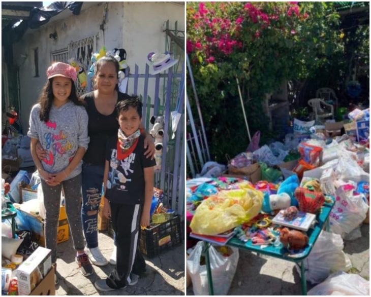 Familia reunida en el frente de su casa recibiendo ayuda de despensa
