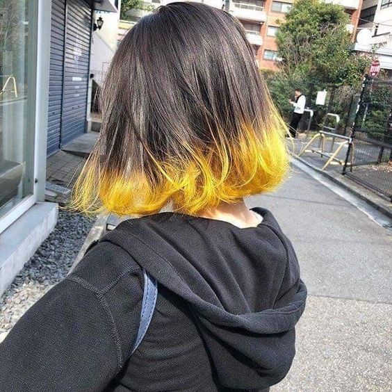 Melena con tono amarillo en las puntas