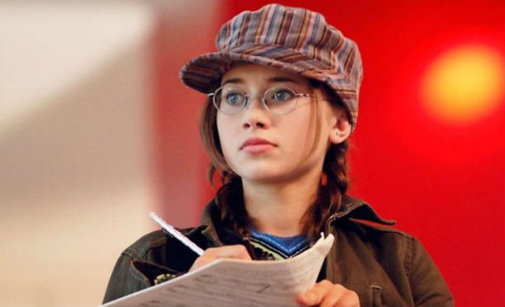 Kelsi de High School Musical, tomando notas