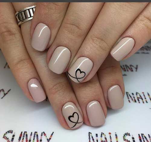 Diseños de uñas en colores rosa y rojo para San Valentín
