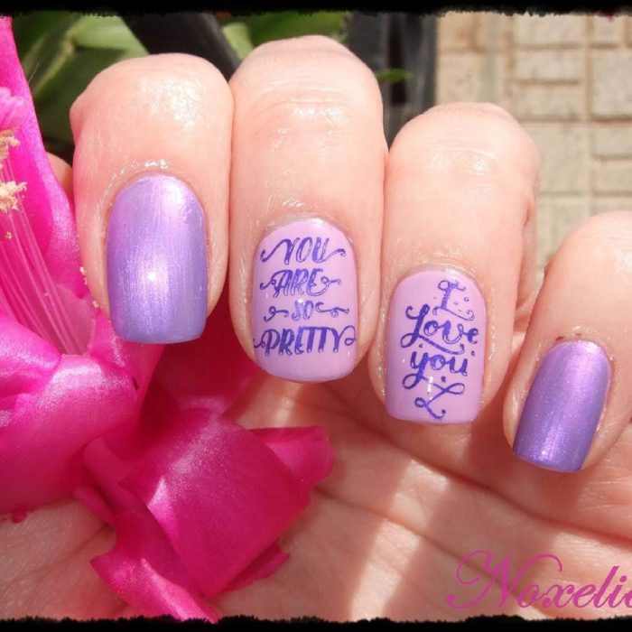 Diseños de uñas en colores rosa y rojo para San Valentín