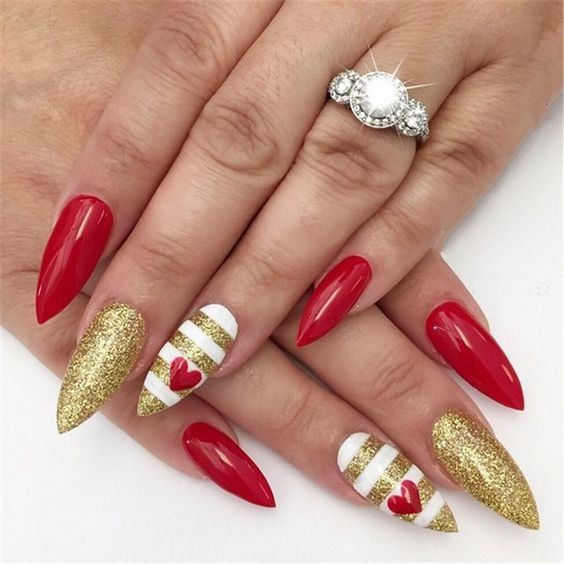 Diseños de uñas en colores rosa y rojo para San Valentín