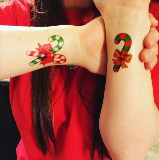 Tatuajes con diseños de bastones de caramelo